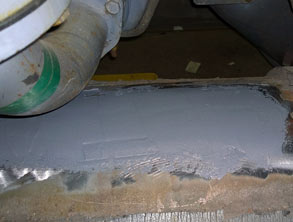 Close up view of the oil sump repair