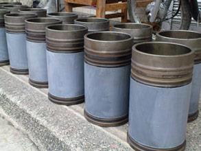 Cylinder liners restored and coated for erosion and corrosion protection