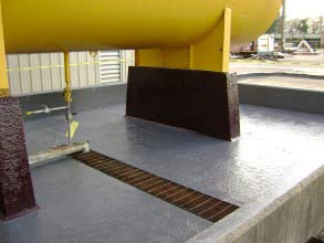Chemical resistant coating applied to chemical bund